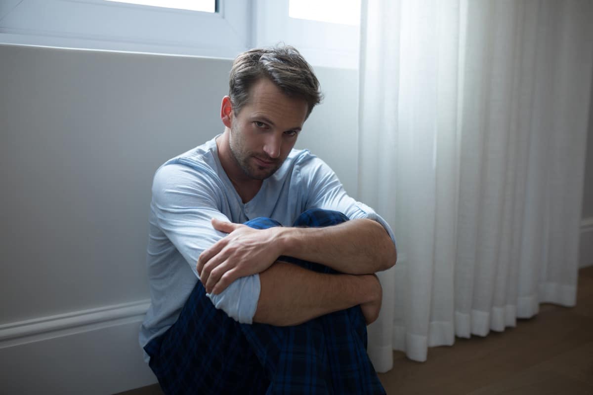 sad man sitting at home 2021 08 28 22 11 11 utc